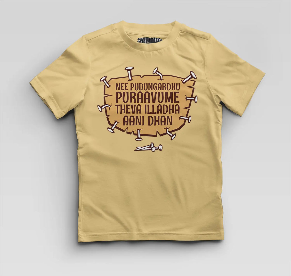 Nee Pudungurathu Puraavume Theva Illadha Aani Dhan Boys Round Neck T-Shirt in Beige Color